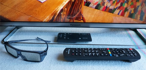 Pedestal stand, remote controls and polarized 3D glasses